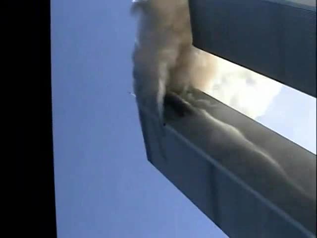 9_11 North Tower - South Face Dripping Smoke Stream(480P)