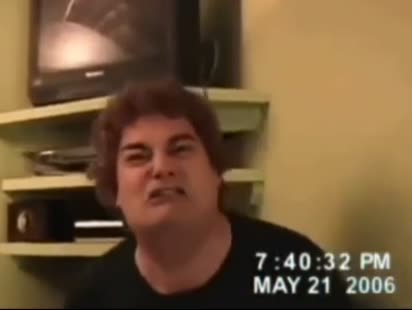 Guy gets scared by the v of doom logo and smashes his computer