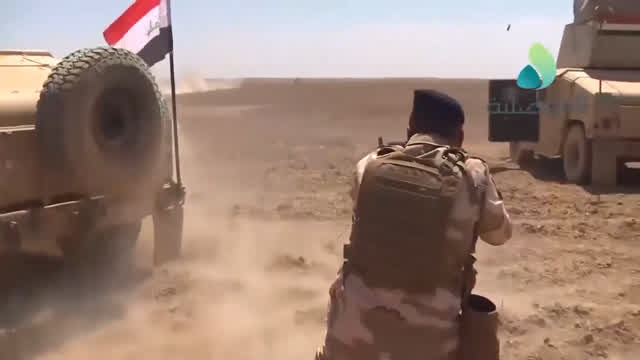 IAF soldiers firing at Daesh positions
