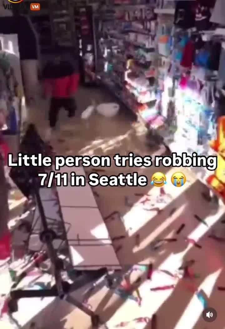black midget try's to rob a 7/11 gets calmly put down by police officer like a toddler throwing a fi