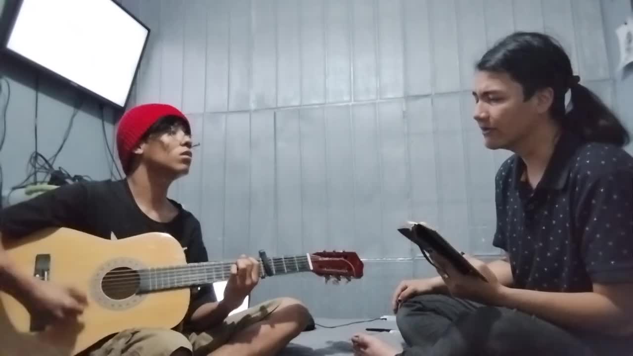 Improvisacion con guitarra y voz